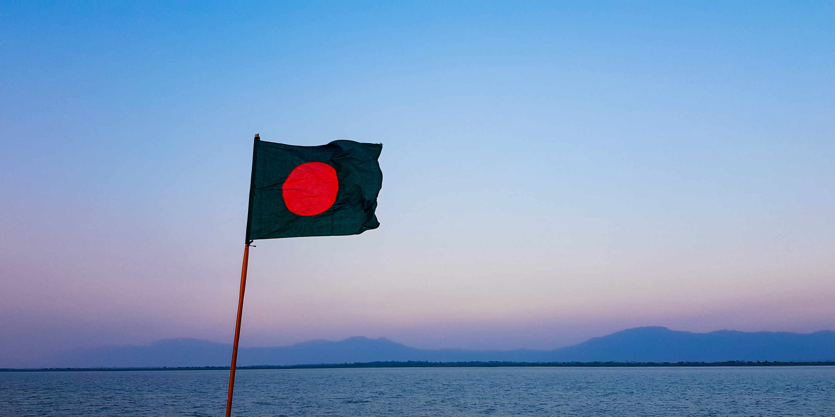 Bangladesh flag over a horizon