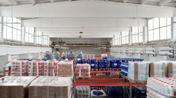 A view of a storage warehouse stocking cartons